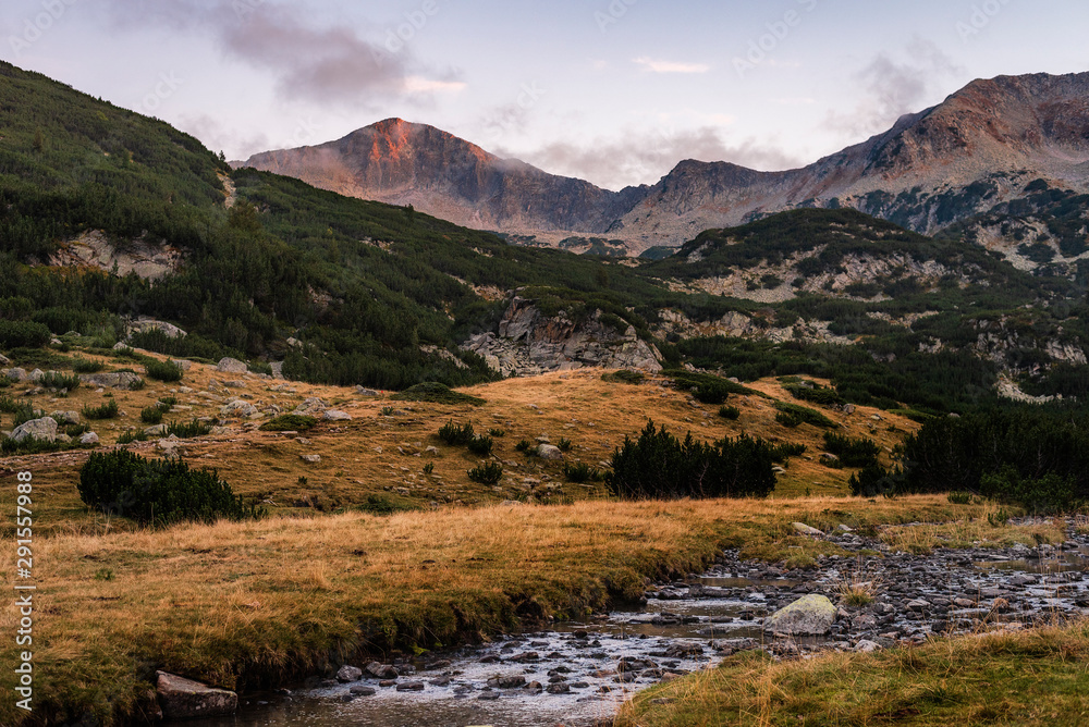 Amazing sunset landscape of Banderitsa river valley and Banderishki Chukar peak, Pirin Mountain, Bulgaria