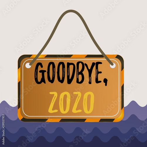 Conceptual hand writing showing Goodbye 2020. Concept meaning New Year Eve Milestone Last Month Celebration Transition Board attach string color black yellow frame rectangle shape photo