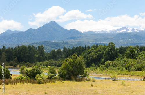 Panoramic Villarica National Park  in Conaripe  Panguipulli  with the Villarica volcano covered by the clouds. Los R  os Region  in Patagonia  Chilean Andes