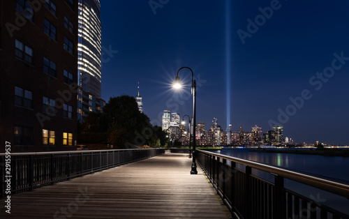 Jersey City, NJ - USA - Aug 30 2019: The 9/11 Tribute in Lights temporary monument in lower Manhattan New York City view from New Jersey