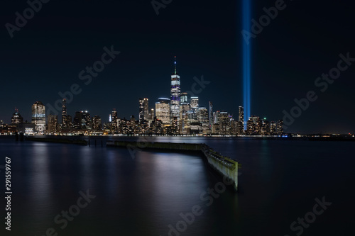 Jersey City, NJ - USA - Aug 30 2019: The 9/11 Tribute in Lights temporary monument in lower Manhattan New York City view from New Jersey © Edi Chen