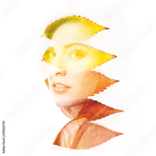 Fototapeta Naklejka Na Ścianę i Meble -  Double exposure portrait of beautiful young redheaded woman and fall leaves isolated on white background. Autumnal seasonal concept design element