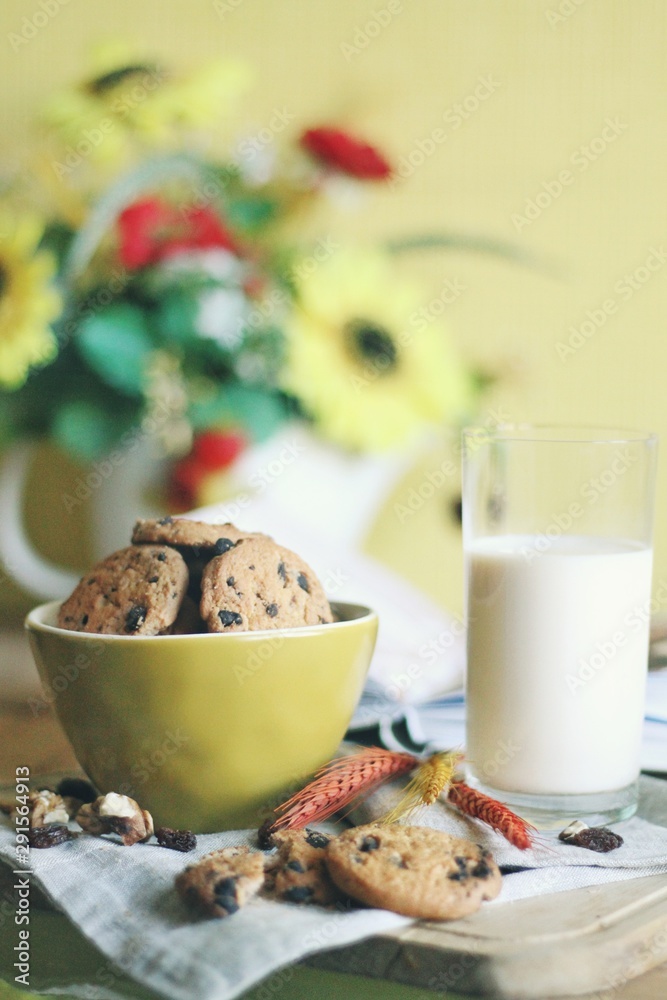 Tasty cookies or biscuits and milk, home comfort