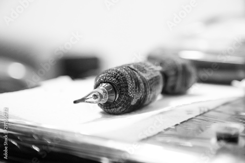 Black and white tattoo machine.