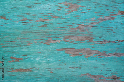 Textured wood with old turquoise paint