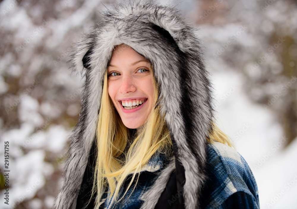 Christmas girl in warm clothing in winter park. Happy girl playing snow winter day. Cold winter weather. Fashion girl in wintertime. Winter holidays. Beautiful woman in warm coat, fur hat and mittens. Christmas girl in warm clothing in winter park. Happy girl playing snow winter day. Cold winter weather. Fashion girl in wintertime. Winter holidays. Beautiful woman in warm coat, fur hat and mittens.