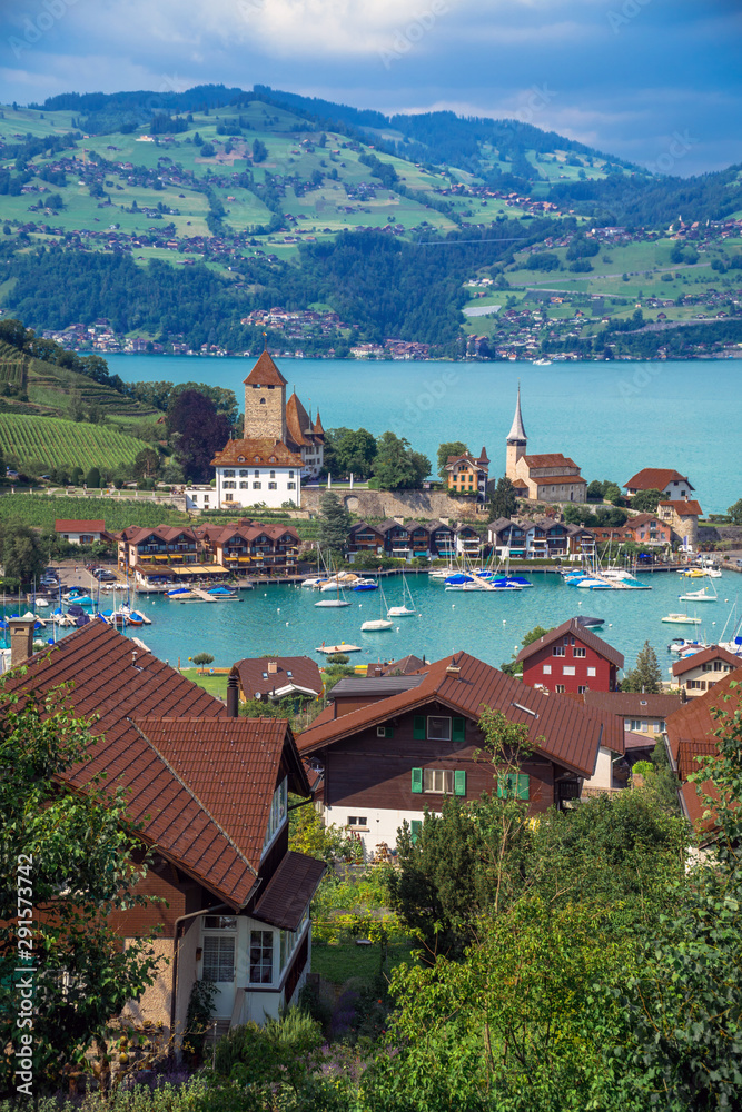 Spiez, Bern / Switzerland - July 3rd, 2019: General view of Spiez on the shore of Lake Thun (Thunersee) in the Bernese Oberland