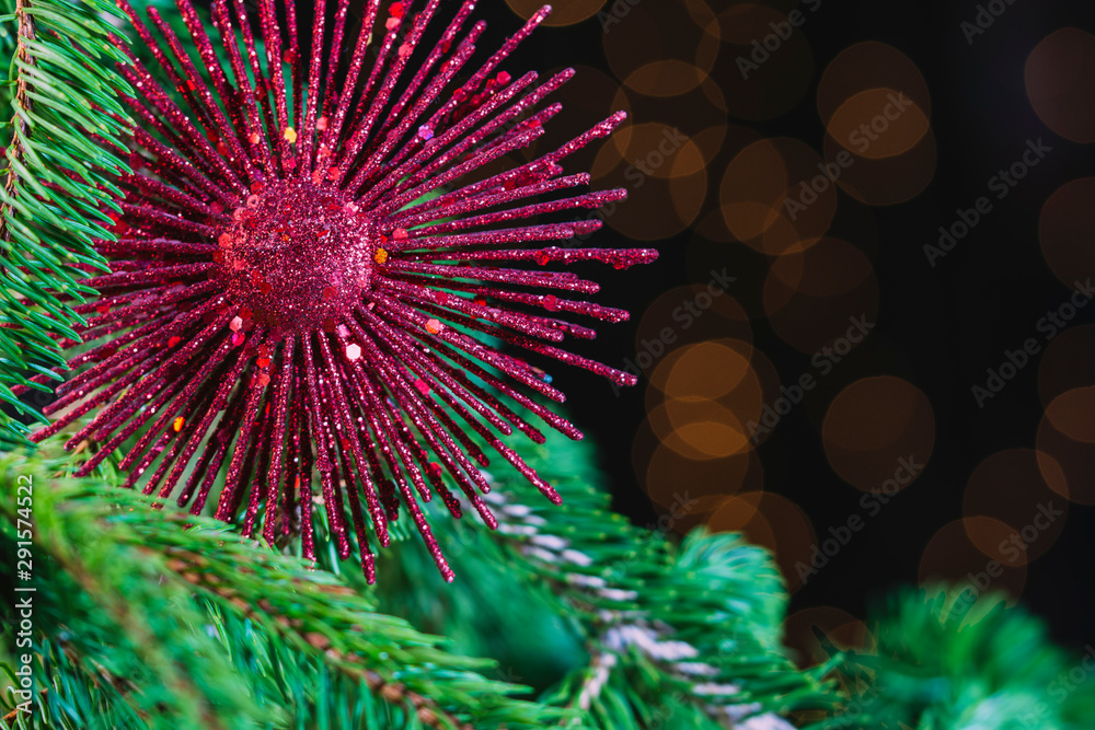 Christmas card with red decoration on tree with copy space Christmas card with red decoration on tree with copy space