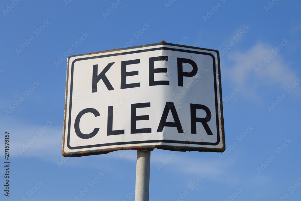 Keep clear road sign in blue sky background, horizontal Keep clear road sign in blue sky background, horizontal