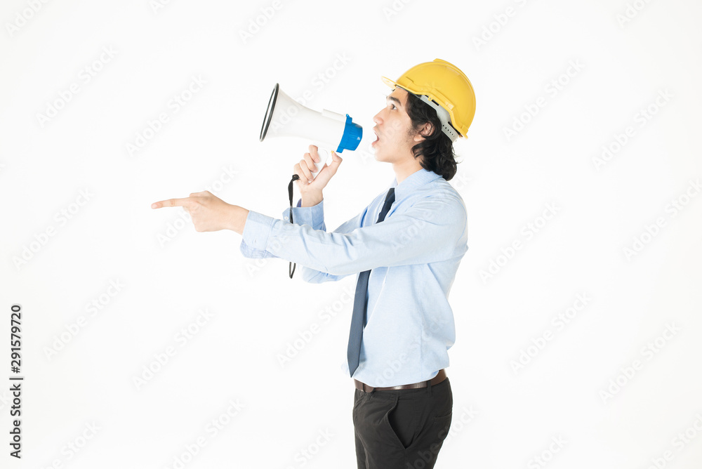 Young engineering man is announcing with megaphone Young engineering man is announcing with megaphone