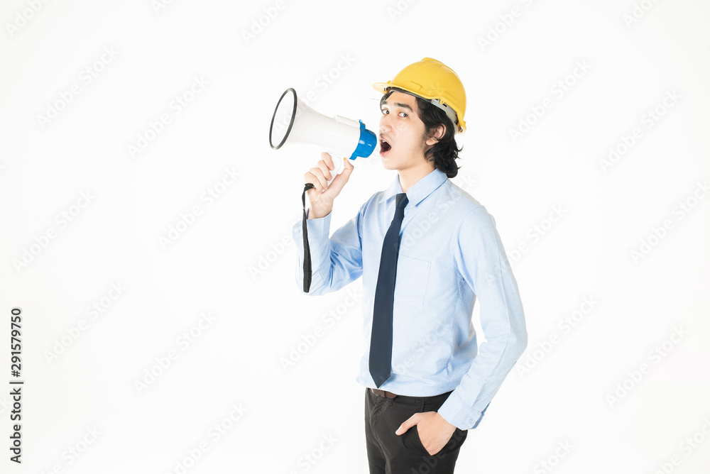 Young engineering man is announcing with megaphone Young engineering man is announcing with megaphone