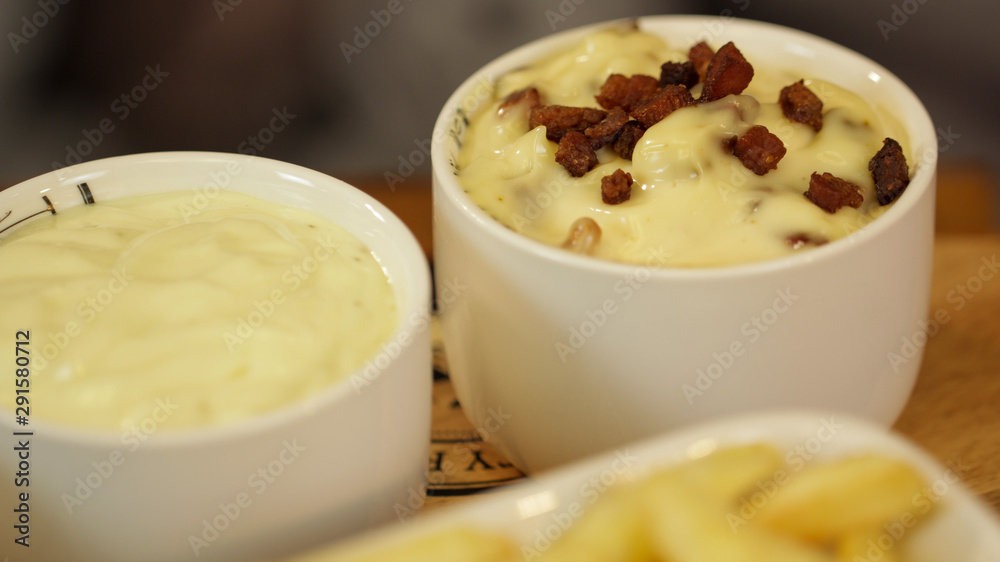 Bacon flavored mayonnaise served in small bowls