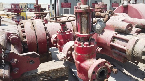 Old Blow Out Preventer (BOP) laying on the shipyard in the desert