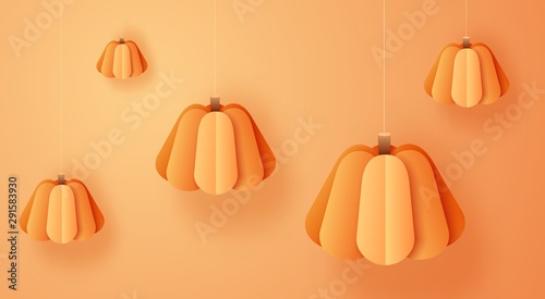 3d abstract paper cut illustration of hanging pumpkins on orange background. Thanksgiving or halloween concept in trendy style.