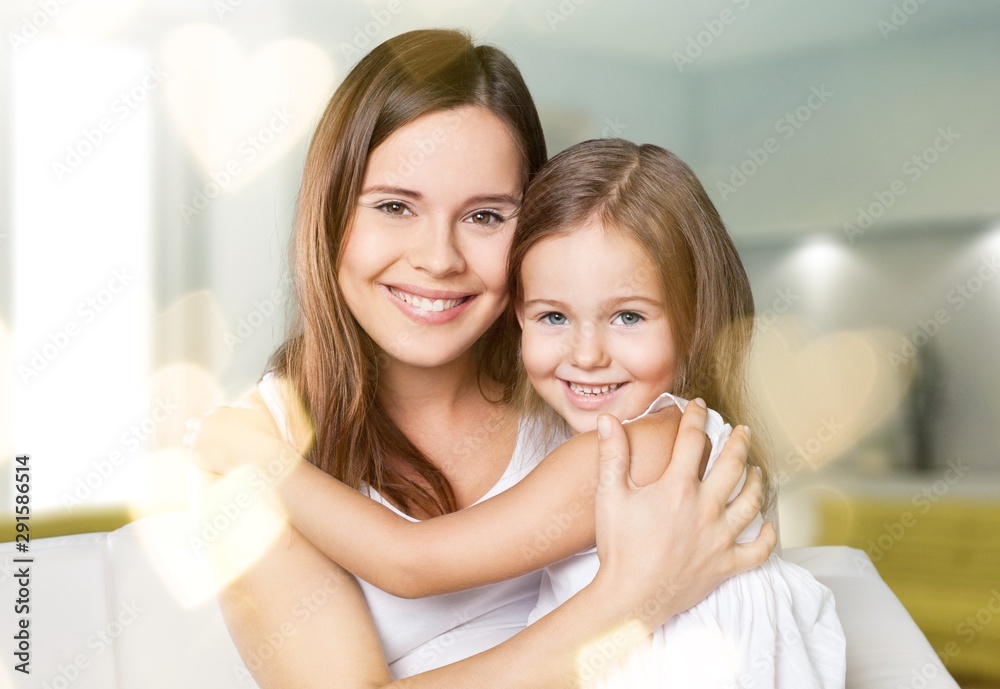 Happy Mother and daughter hugging Happy Mother and daughter hugging