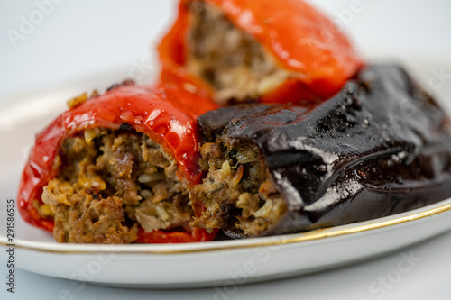 Tasty lunch, stuffed peppers and eggplant photo