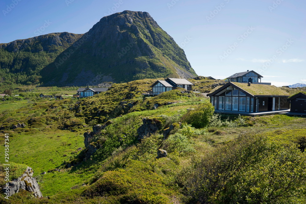 Obraz premium Traditional houses in the mountains of Lofoten, Norway