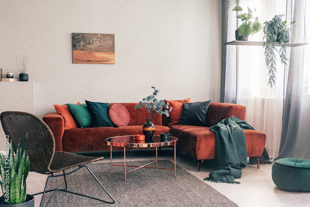 Cozy living room interior with corner sofa with pillows and painting on the wall - obrazy, fototapety, plakaty 