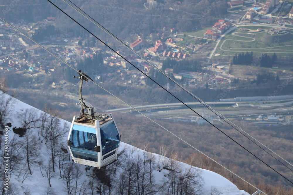 Obraz premium Ski-lift on ski resort. Cable car