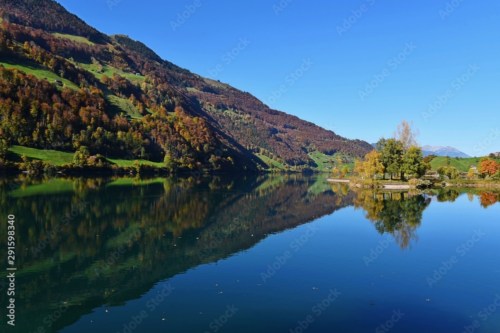 lake in mountains,lungern switzerland