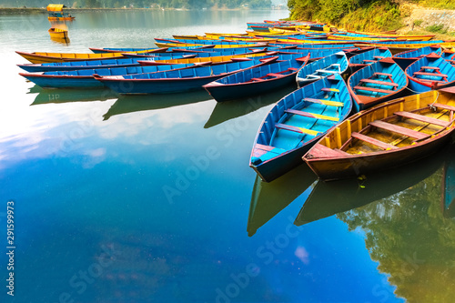 Beautiful view of Mufti color boats in Begnas Pokhara lake,