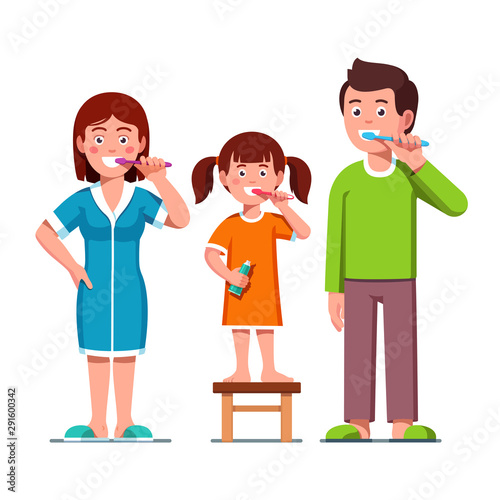 Family parents with kid brushing teeth together