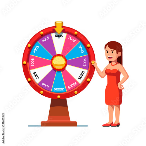 Smiling woman spinning colorful wheel of fortune
