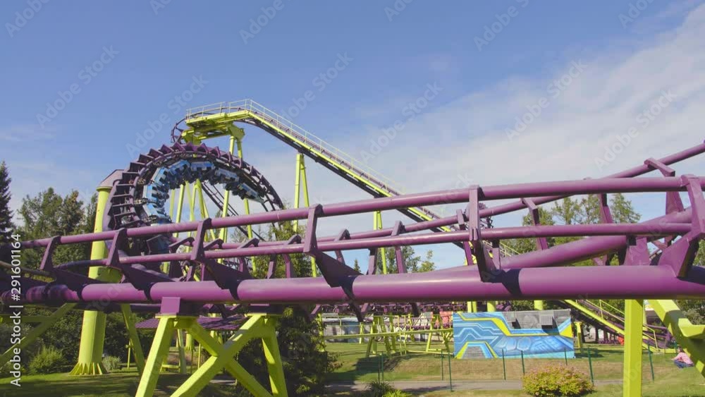 Cars of roller coaster move along track Cars of roller coaster move along track