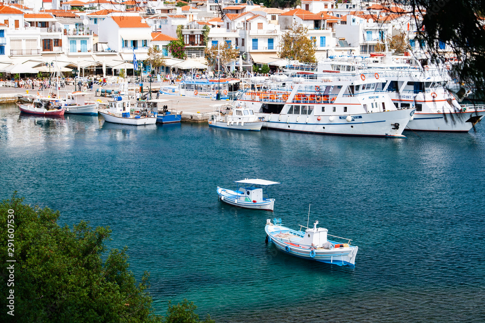 boats in a bay in the scenic island Skiathos