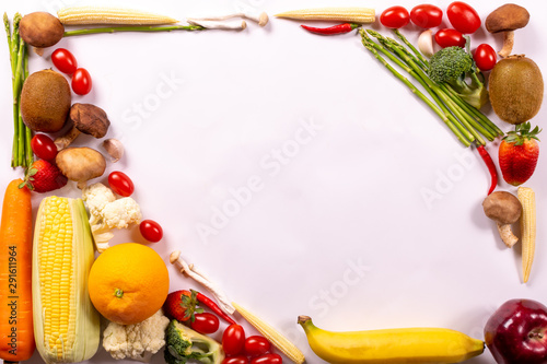 World food day or vegetarian day concept. Top view of fresh vegetables, fruit, herbs and spices with a empty on white paper background.