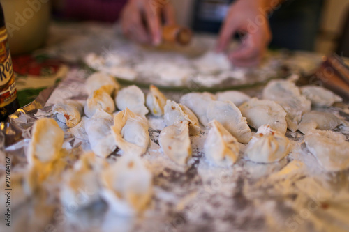 Mom making dumpling for transitional Chineses New year