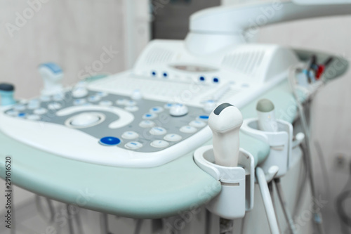 Professional medical white ultrasound device in clinic.