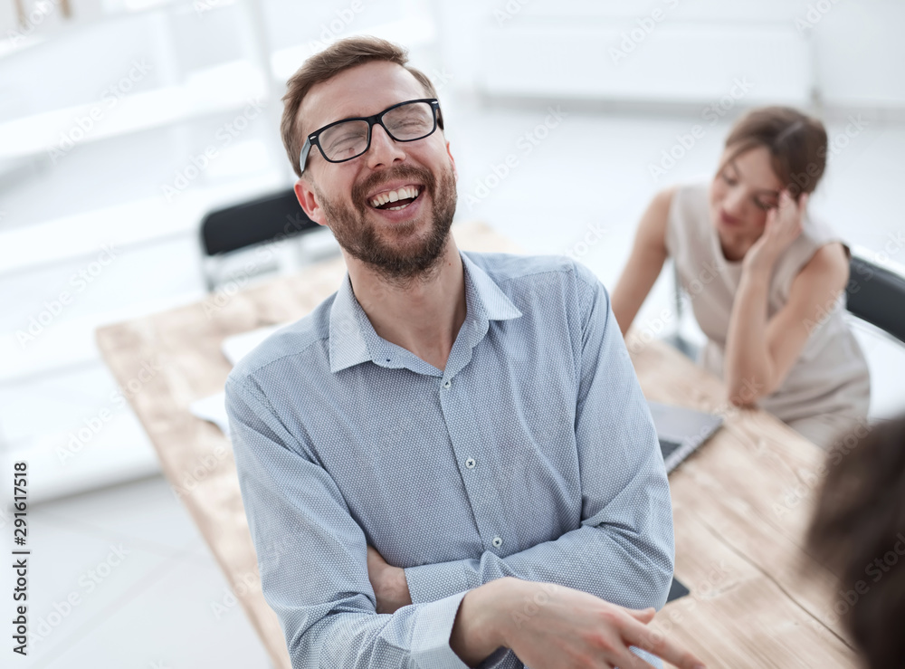 close up.young employee discussing his ideas with colleagues