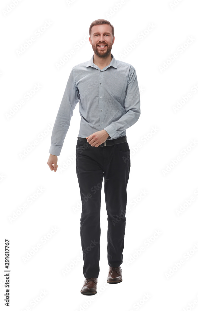 in full growth. smiling business man confidently steps forward in full growth. smiling business man confidently steps forward