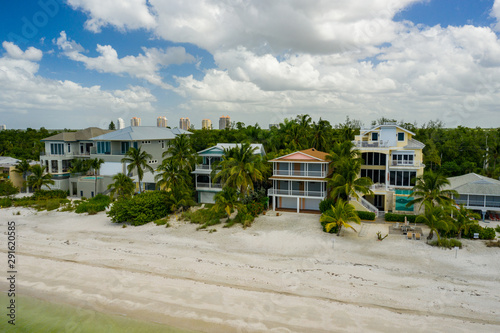 Aerial photo beachfront vacation homes Barefoot Beach FL