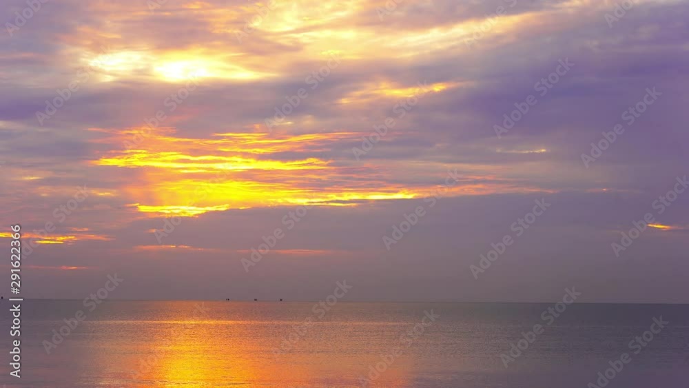 Mesmerizing golden hour clouds dawning the skies of beach Koi Samui, wide shot Mesmerizing golden hour clouds dawning the skies of beach Koi Samui, wide shot