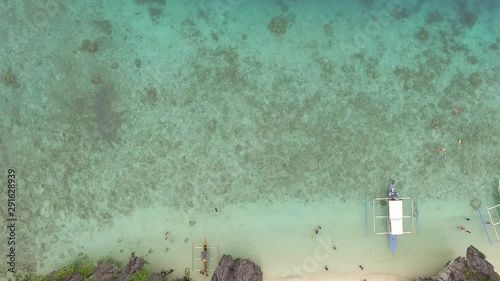 Transitioning from coral sea to tropical limestone jungle cliffs