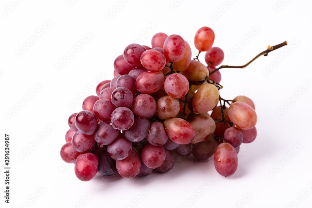 Fototapeta premium Bunch ripe red grape isolated on white background.
