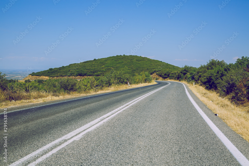 Greek Republic. Way and mountains, grass and trees. 13. Sep. 2019