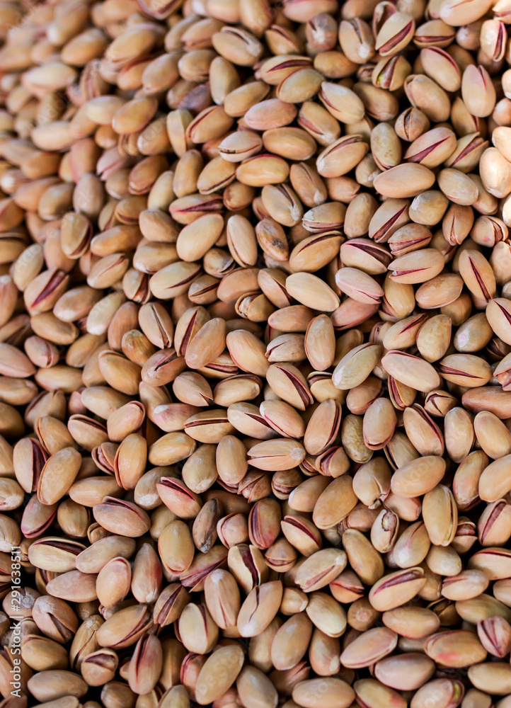 Pistachio nuts on the counter in the market Pistachio nuts on the counter in the market