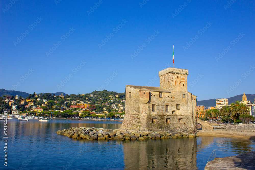 italian castles on sea italian flag - castle of Rapallo , Liguria Genoa Tigullio gulf near Portofino Italy .