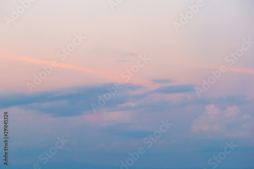 The white clouds in the sky in the afternoon till evenimg. 