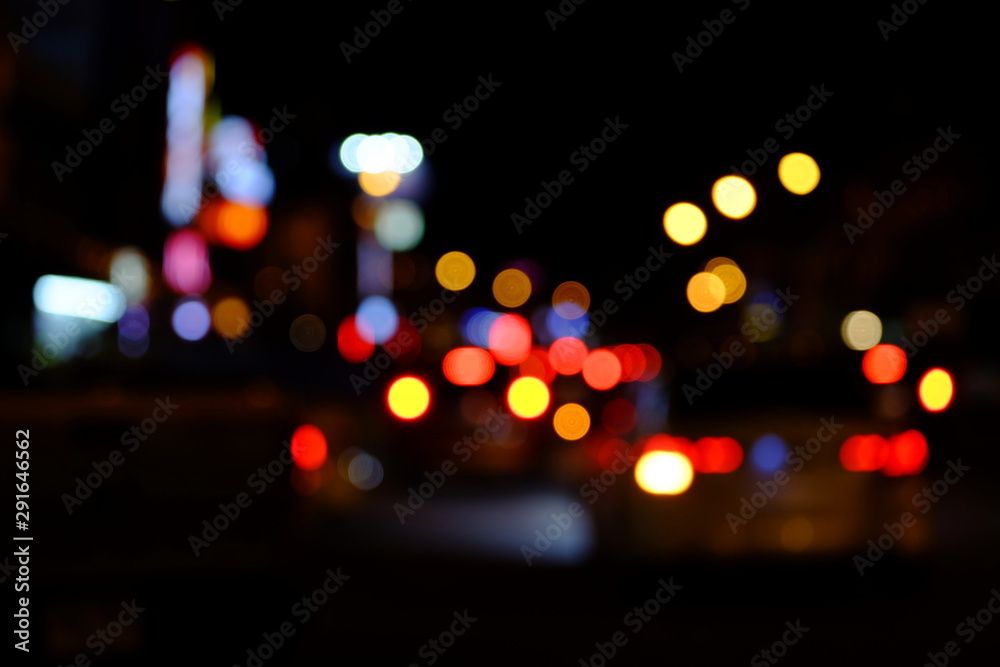 Fototapeta premium Abstract blurred of blue and silver glittering shine bulbs lights background:blur of Christmas wallpaper decorations concept.christmas light night