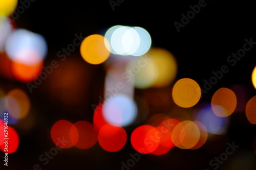 Abstract blurred of blue and silver glittering shine bulbs lights background:blur of Christmas wallpaper decorations concept.christmas light night © tharathip