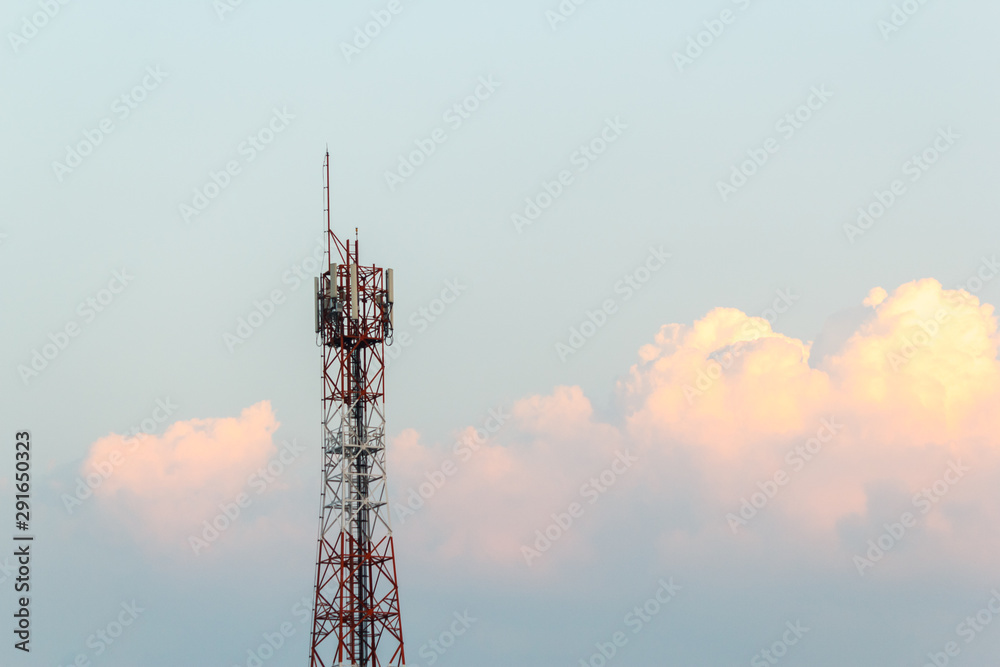 Telecommunication tower on shiny blue sky