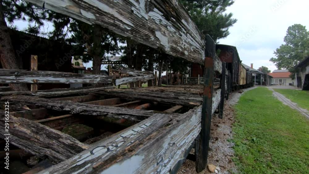 4K Right truck moving abandoned railway wooden train wagon 4K Right truck moving abandoned railway wooden train wagon