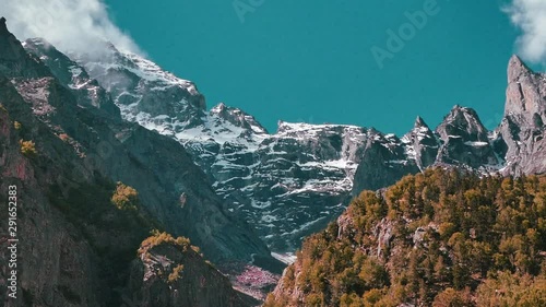 Cinematic shot of snow mountains in gangotri region , India photo