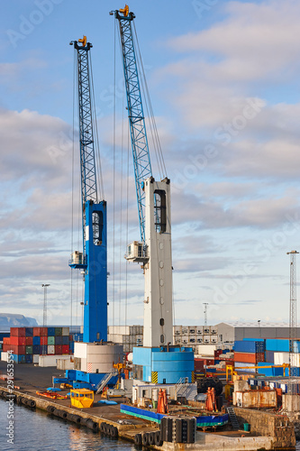 Comercial harbor with cranes and containers in Torshavn, Faroe photo