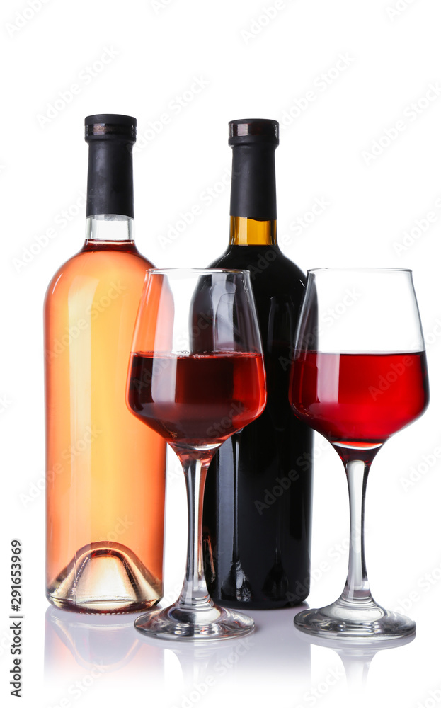 Glasses and bottles of different wine on white background Glasses and bottles of different wine on white background