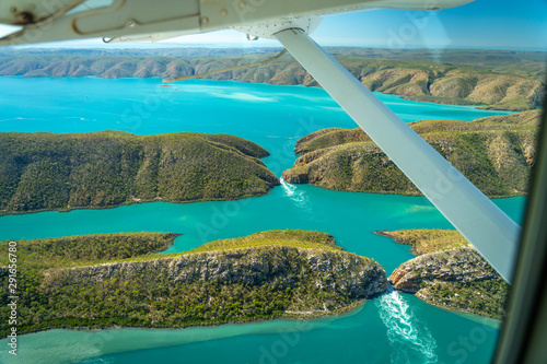 View from under the wing of the plane over the horizontal falls site in Western Australia photo